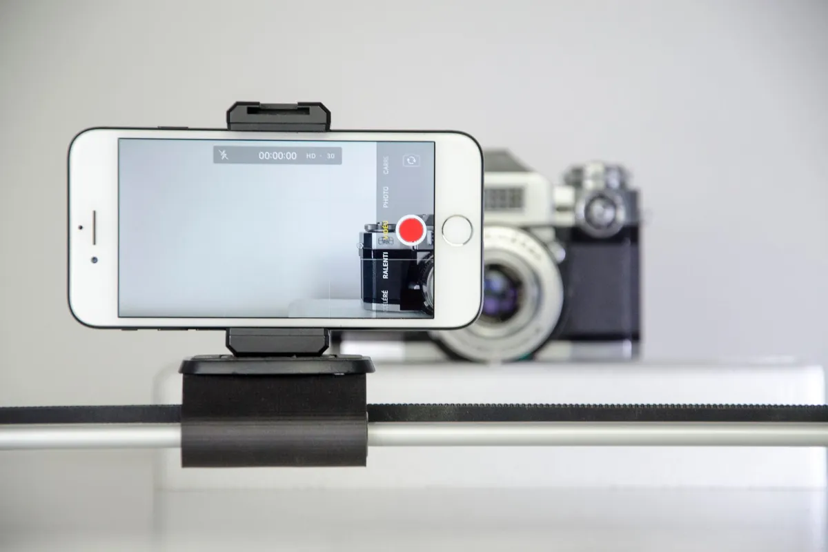 A smartphone recording a product close up on a table